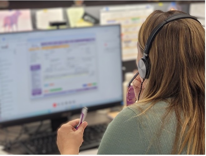 WIC Nutritionist at her desk completing an over the phone appointment